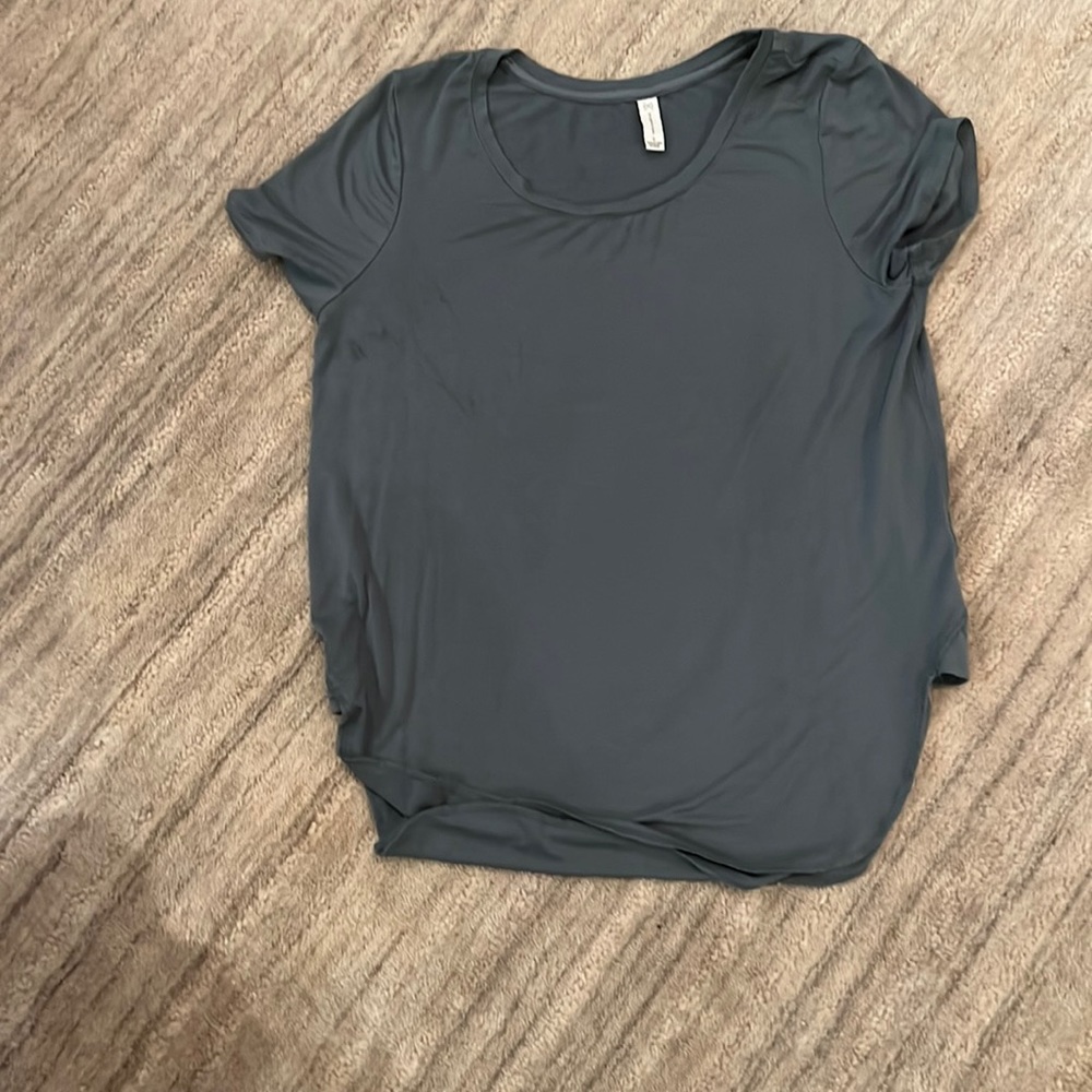 Super soft rayon and comfortable t-shirt.  Relaxed fit.